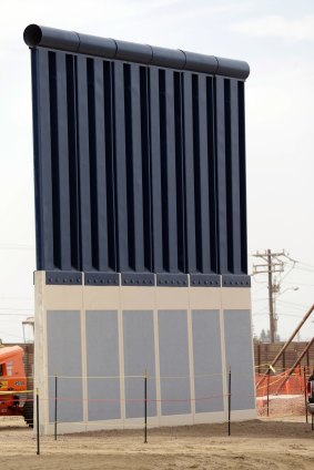 A border wall prototype stands near the border with Tijuana, Mexico, in San Diego.