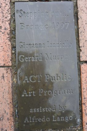 A plaque is all that is left of the stolen artwork.