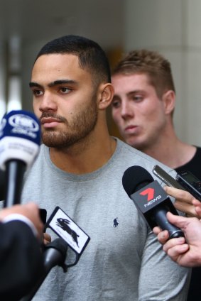 Dylan Walker speaks to the media after his hosptial release on Friday. Aaron Gray, who also overdosed on prescription pain killers, is in the background.