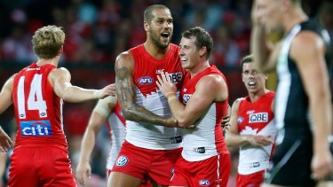 Goal: Lance Franklin and Harry Cunningham of the Swans celebrate.