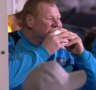 Sutton United reserve goalkeeper Wayne Shaw eats a pie on the bench in FA Cup loss to Arsenal