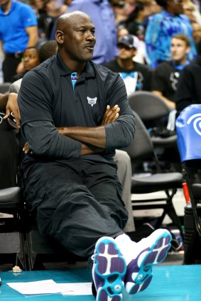 Pride: Owner Michael Jordan watches his team from his courtside seat.