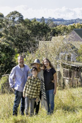 "The bigger the dump the better", says Dean Lewis, who started buying and renovating property when he was 21. He is pictured with his wife Sally and their children Bronte  and Dan.