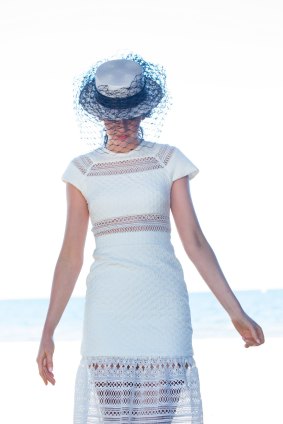 The monochrome dress code for Derby Day is a springboard for textured laces, veiling and other accents. Dress by Nicola Finetti, hat by Philip Treacy at Christine.