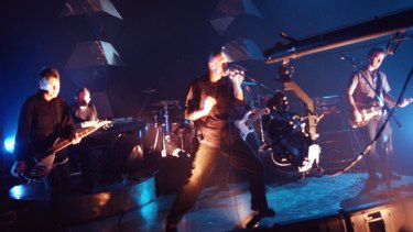 Midnight Oil performing live.