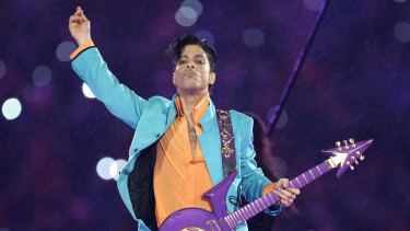 Prince performs at the Super Bowl halftime show in 2007.