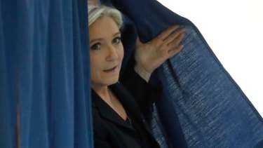 Far-right leader and candidate for the 2017 French presidential election Marine Le Pen exits a polling booth.