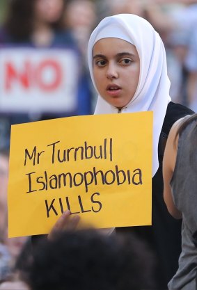 A protester sends a message to Australian Prime Minister Malcolm Turnbull in Melbourne.