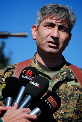 Redur Khalil, a spokesman for the Kurdish YPG militia, near the besieged town of Tel Hamis. 