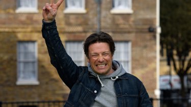 Jamie Oliver celebrates after the announcement of a tax on sugary soft drinks in Britain. Will Australia follow?