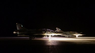 A French air force jet takes off from a site in Jordan to strike at Islamic State group targets in Syria in November 2015. French special forces are operating in Libya, according to Le Monde.