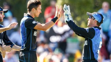 Out: New Zealander Trent Boult celebrates dismissing Calum MacLeod.