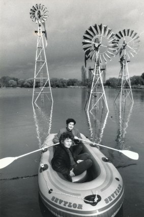 Fiona Hooten, with paddles, and Catrina Vignando with their windmill sculptures.