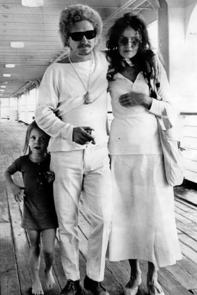 Brett, wife Wendy and daughter Arkie Whiteley arrive back in Sydney from Britain in 1969.