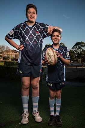 Angus Talbot (left) and Luke Harrison are both 14 and both play for the Lindfield Junior Rugby Club. Luke has just been withdrawn from the comp by his ex-Waratah dad because his dad thinks the game has become too dangerous.