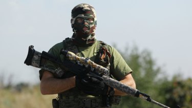 A pro-Russian rebel sniper on the outskirts of Shakhtersk in eastern Ukraine, July 2014.