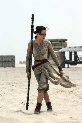 Daisy Ridley as Rey in a scene from the film, <i>Star Wars: The Force Awakens</i>.