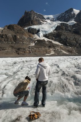Athabasca Glacier with park visitors.
