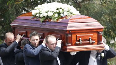 Clarke was among the pallbearers at Hughes' funeral.