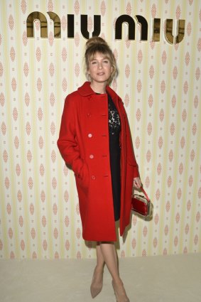 Renee Zellweger in her stunning red coat.
