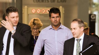 Gable Tostee, left, leaves the Supreme Court in Brisbane with defence barrister Saul Holt, right.
