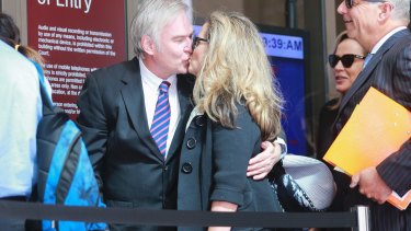 Kathy Jackson, and her partner Michael Lawler, arrive at the Melbourne Magistrates Court on Monday.