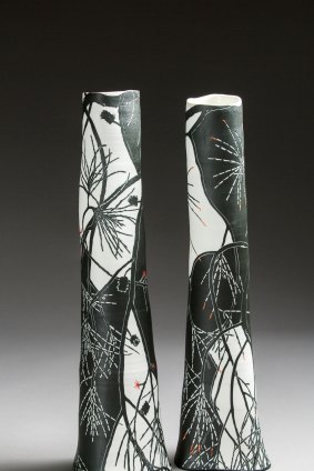 Franzi's <i>Black She-oak (male and female)</I>, provides an intertwined play of black and white patterns.