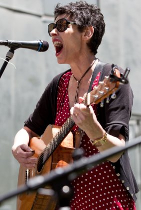Deborah Conway performs at the Melbourne Busk Protest against Radio National program cuts in December. 