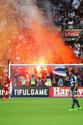 Flares set off during the A-League derby.