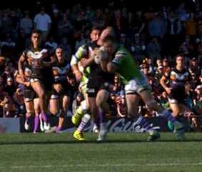 Close contact: Jack Wighton goes in hard.