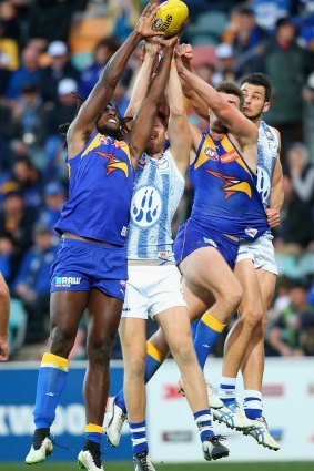 Nic Naitanui of the Eagles and Lachlan Hansen of the Kangaroos compete for a mark when the teams met in round 10.