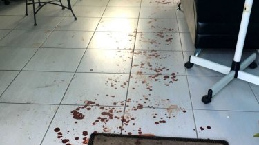 Blood on the floor of the Minto hair salon.