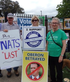 Marj Armstrong, centre, at an anti-merger protest in Orange last year.