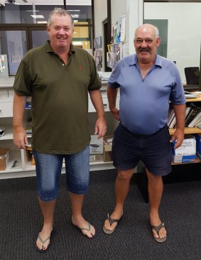 Bega Court registrar John Chalker, left, and court officer Paul McGrath, right, went to work on Monday unsure if their homes were still standing.