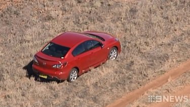 Stephanie Scott's car on the side of the road in a wheat field about eight kilometres from Leeton.