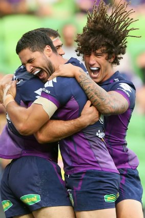 Storm's Dale Finucane is congratulated by team mates after scoring a try.
