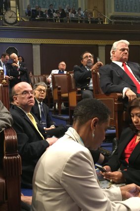 Democrat members of Congress, including, from left, Steve Cohen, Senator Al Franken and Raul GriJalva participate in the sit-down protest.