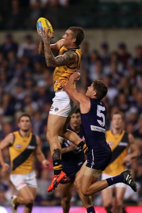 Richmond were exceptional in denying the Dockers possession in Perth at the weekend: Dustin Martin marks the ball (above).