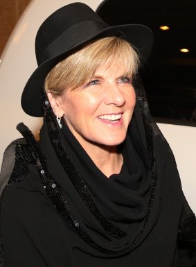 Foreign Affairs minister Julie Bishop wearing a black head scarf and hat arrives in Tehran, Iran, in the early hours of Saturday.