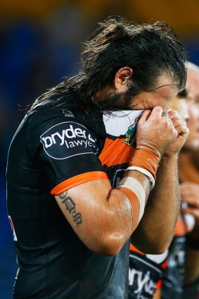 DISPIRITING:  Aaron Woods of the Tigers looks dejected during the round three loss to the Gold Coast Titans(Photo by Jason O'Brien/Getty Images)
