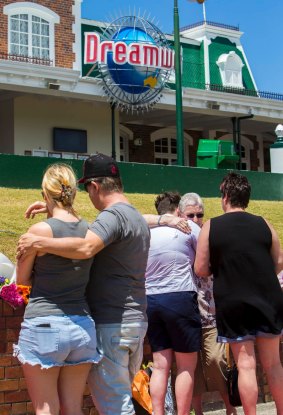  Locals grieve and pay their respects at Dreamworld.