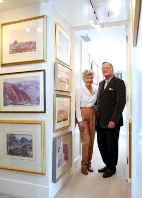 Marilyn and Gordon Darling in their St Kilda Road apartment surrounded by a collection of Albert Namatjira paintings.
