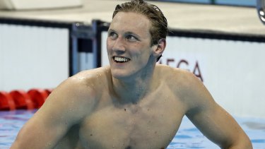 Winner: Australia's Mack Horton smiles after taking out gold in the final of the men's 400m freestyle.