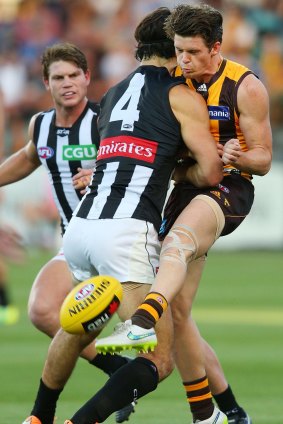 Having an impact: Brodie Grundy bumps Taylor Duryea on Thursday. 