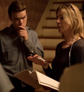 Kathryn Bigelow with Will Poulter on the set of <i>Detroit</i>.
