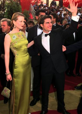 Nicole Kidman, with then husband Tom Cruise at the 1997 Oscars, wearing Dior by John Galliano.