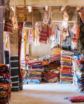 Colourful rugs for sale in the souks.