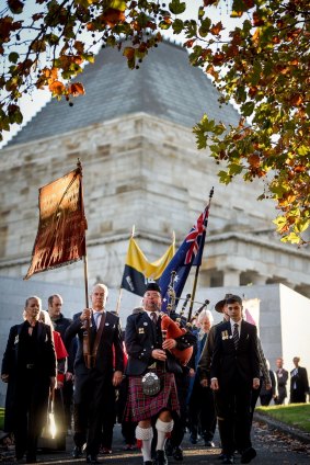 Descendants of the original Anzacs held an alternative service at the Shrine, after being banned from marching with their battalion banners. 