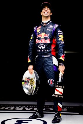Not likely: Daniel Ricciardo with his trophy before being disqualified in last year's race. 