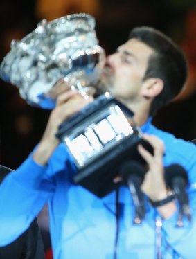 Last year's Australian Open winner,  Novak Djokovic of Serbia, with the Norman Brookes Challenge Cup. 